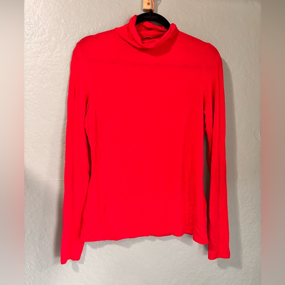 Red turtleneck blouse